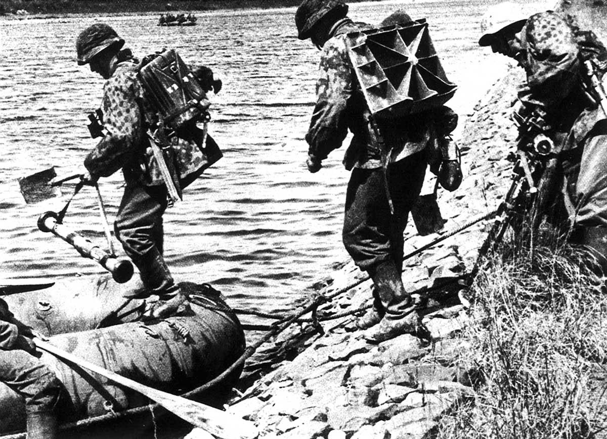 Current Caption: German troops crossing a river in France, 1940