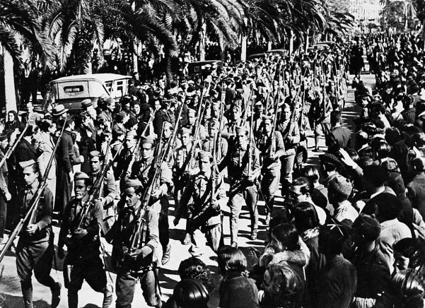 Nationalist troops in Spain during the Civil War. Assistance given by Nazi aircraft was crucial to the Nationalist cause.