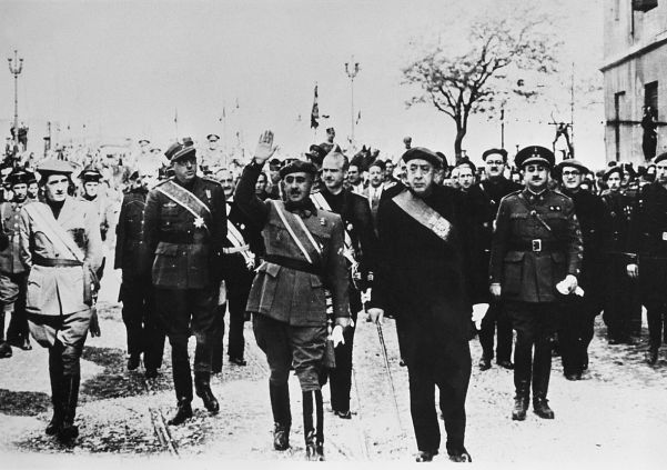 General Francisco Franco (centre, waving), leader of Spain’s Nationalists whom Hitler supported from 1936.
