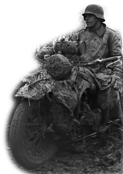 A muddy German motorcyclist on the Eastern Front in the fall of 1941