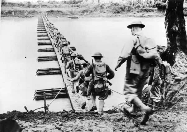 US troops in the Philippines prepare to meeting the Japanese invaders who landed on the islands in December 1941
