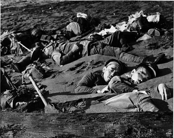 Dead Japanese troops lying in a river bed on Guadalcanal