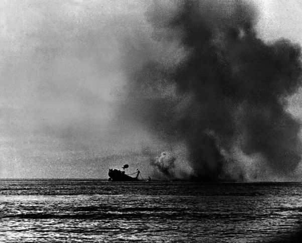 A British vessel from the PQ-17 Artic convoy sinks after being torpedoed by a U-boat