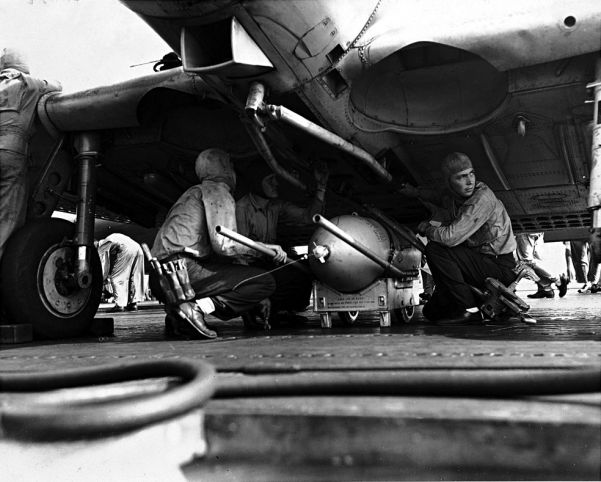 American ground crew prepare an aircraft for action during US offensives against the Japanese on Guadalcanal