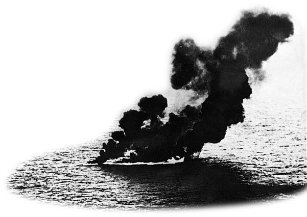 The blazing hull of a Japanese ship hit by US aircraft off the Soloman Islands
