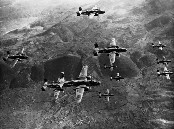 US B-25 medium bombers on their way to pound German units dug in amid the ruins of Monte Cassino