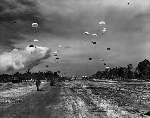 Paratroopers belonging to the US 503rd Parachute Infantry Regiment land on Kamirir airstrip, Noemfoor, July 2, 1944